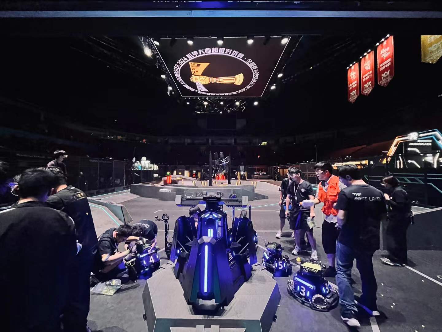 The RoboMaster 2024 arena in Shenzhen with Illini RoboMaster robots in the foreground
